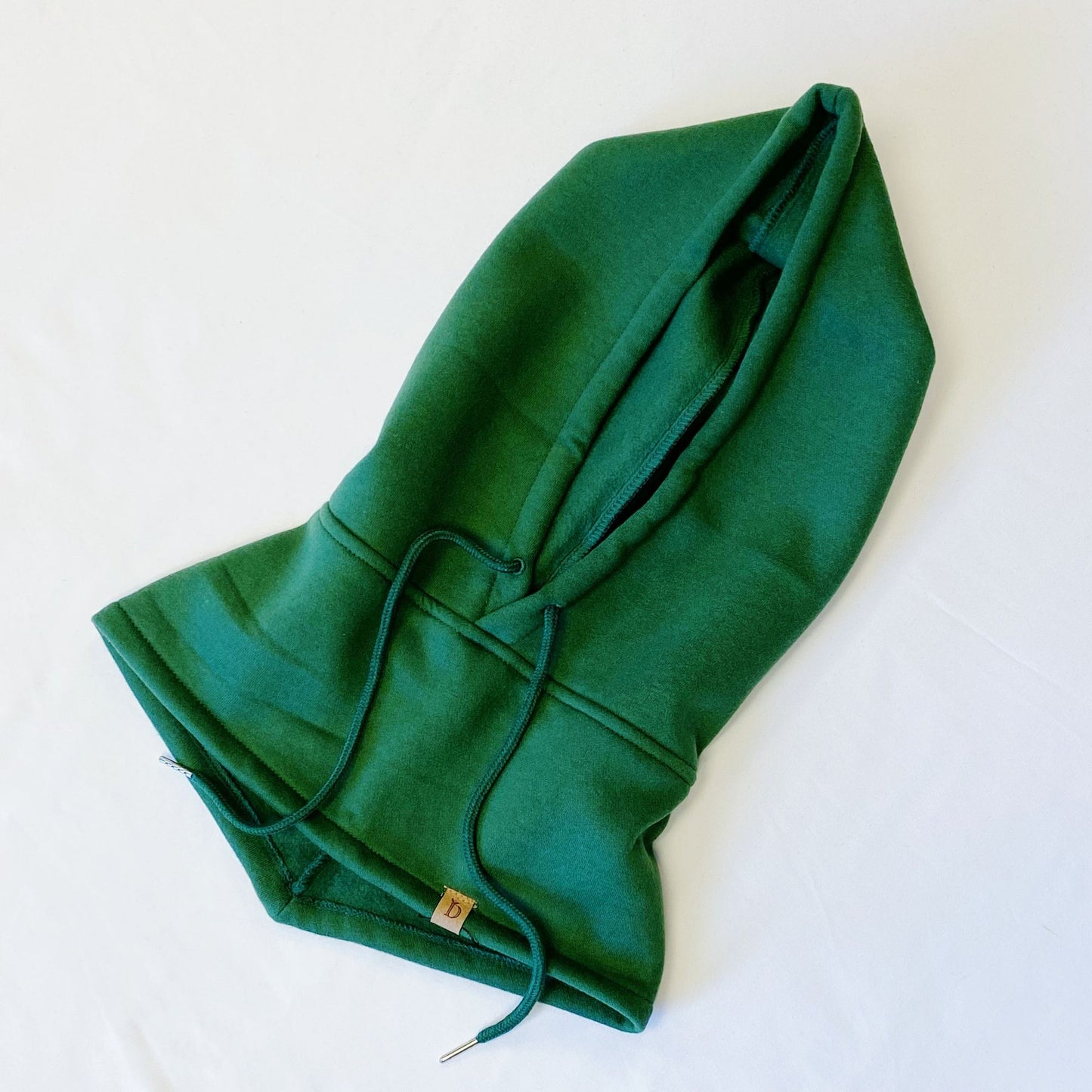 Cozy green hoodie with a large front pocket and adjustable drawstring hood, displayed on a white background.