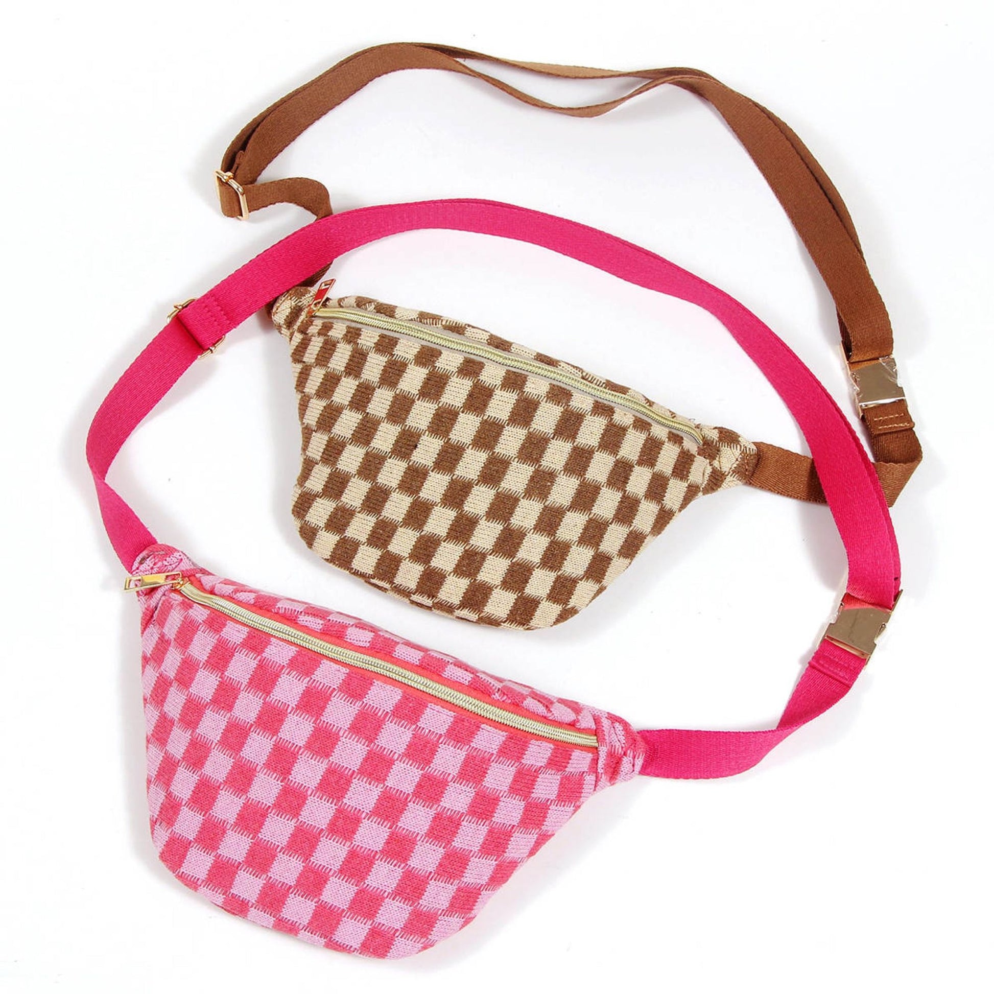 Two stylish fanny packs in brown and cream checkered pattern and pink and white checkered pattern, featuring gold zippers and adjustable straps.