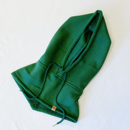 Cozy green hoodie with a large front pocket and adjustable drawstring hood, displayed on a white background.